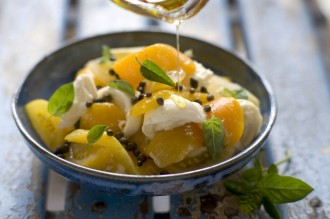 Golden tomato, yellow capsicum and fresh mozzarella salad. Photograph: Rodney Weidland