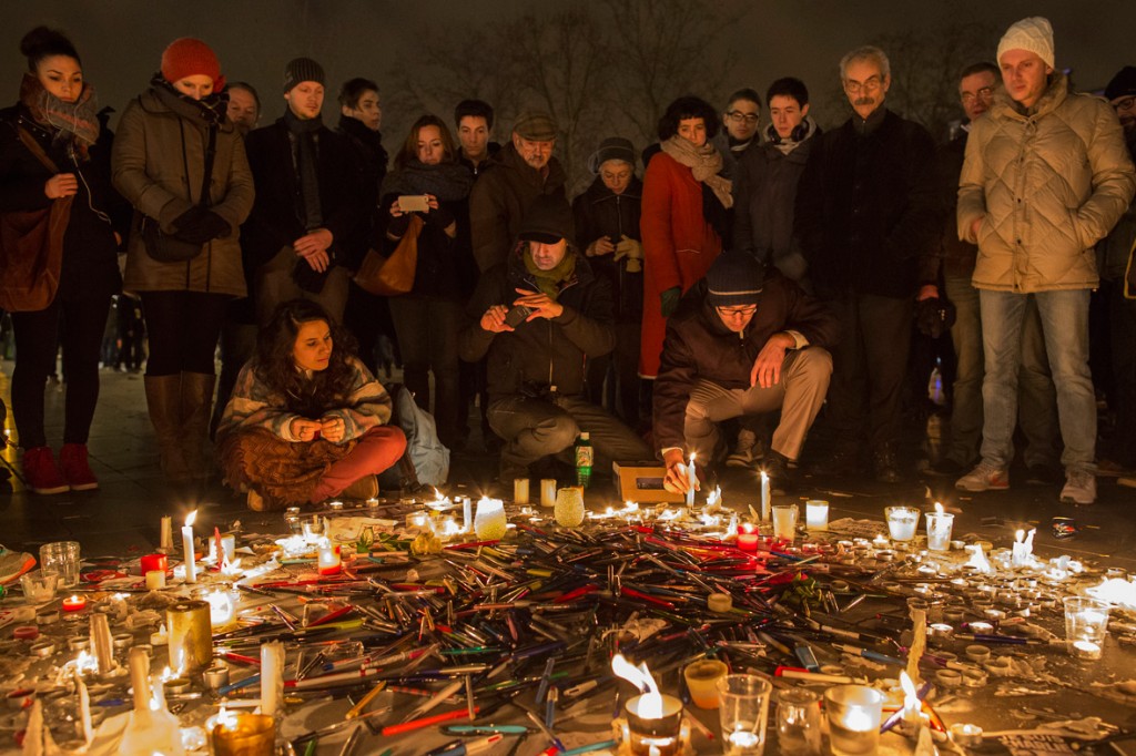 Paris, France: People congregate around pens and candles during a vigil at the Place de la Republique(Dan Kitwood/Getty Images)