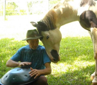 Doug and Echo enjoing a soulful moment during a horse and musician get together at Aurora Valley, run by Beate Somer.