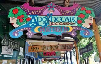 Colourful signs are part of the unique character of Nimbin's Cullen Street.