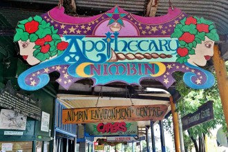 Colourful signs are part of the unique character of Nimbin's Cullen Street.