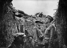 Captain Leslie Morshead in a trench at Lone Pine after the battle at Gallipoli, looking at Australians and Ottomans dead on the parapet.  Source: Wikipedia