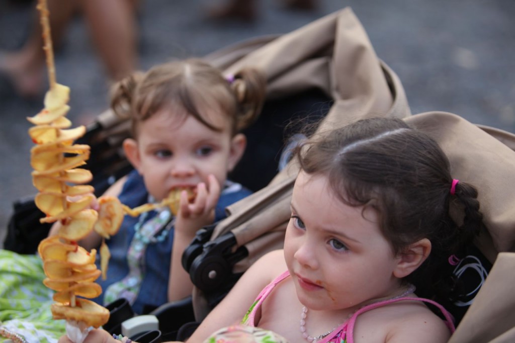 Three-year-old Tahlia and two-year-old Yemaya try their first Potato Head.