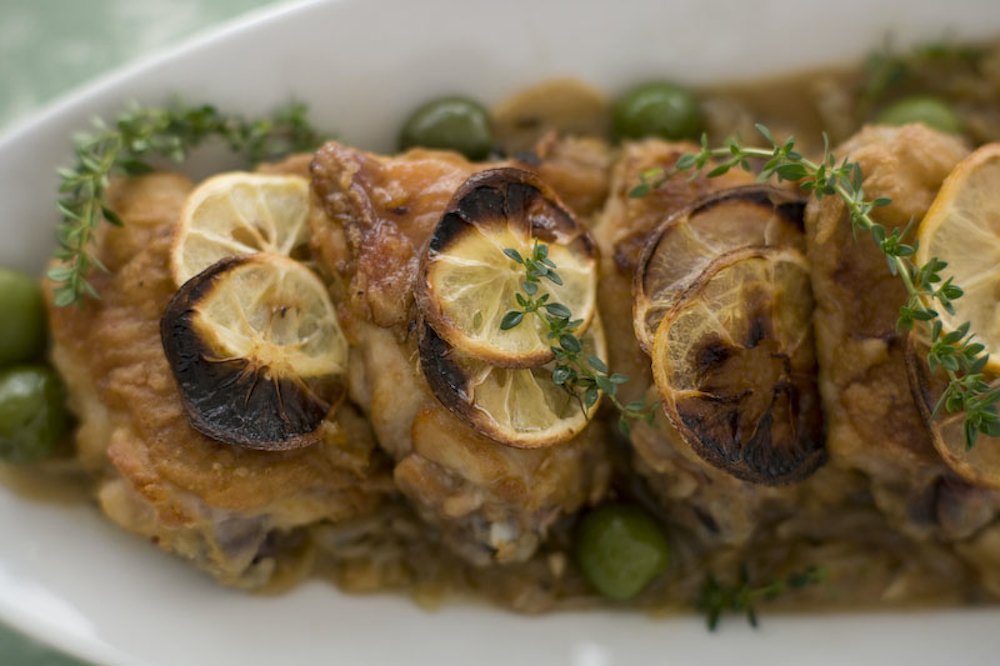 Chicken with slow cooked onions and lemons. Photo by Rodney Weidland.