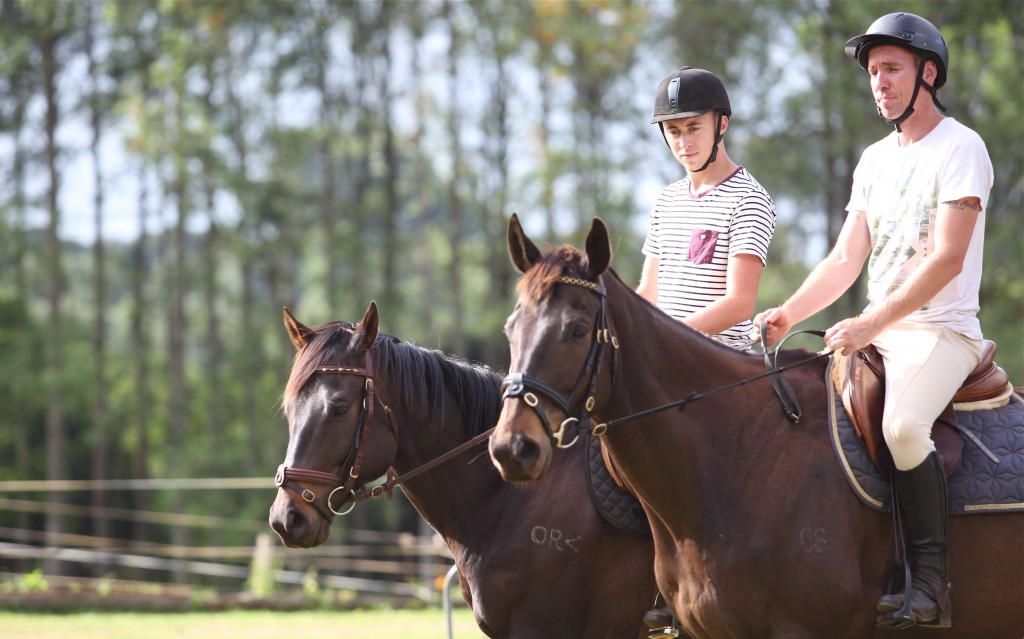 Sam (left) with Benji, a rescue horse, and Brendon with Zorro. 