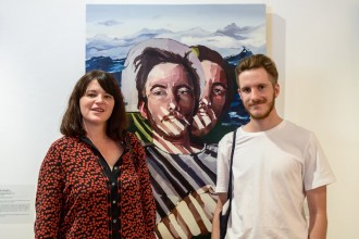 Fiona Lowry (judge, and 2014 Archibald Prize winner), Bryce Anderson in front of Bryce's self-portrait, Bathed in Doubt.