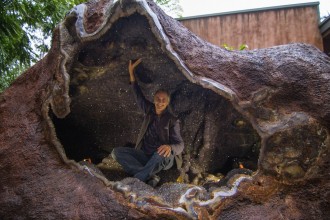 Crystal Castle owner Naren King, inside the world's largest amethyst geode.