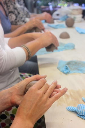 Student hands at Vicki Grima's 'Pinch Me' workshop.