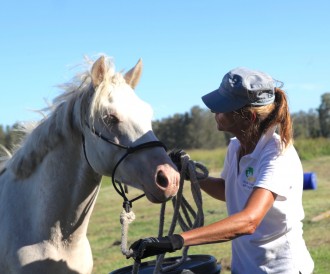 EFL Director Elaine Hughes showing Angelo how to move.